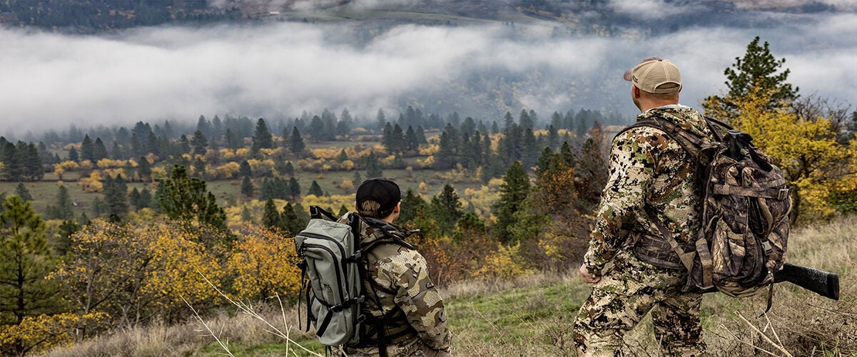 people on top of mountain